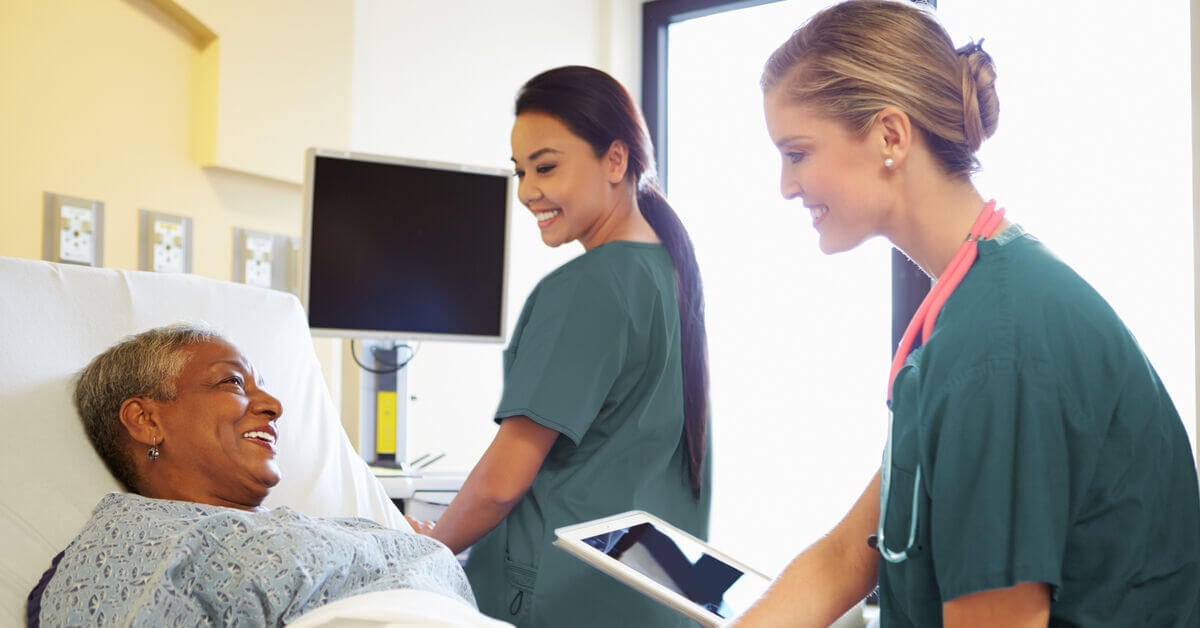 nurses with a patient